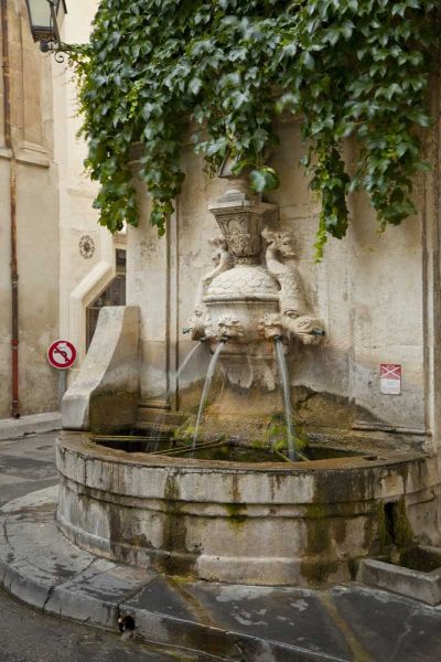 France, Provence, Water fountain on street corner